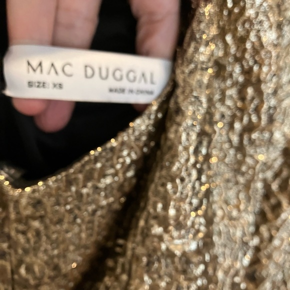 Great dress look so runway. Has tag on and I wore it to a disco Gala. $150 - Picture 3 of 7